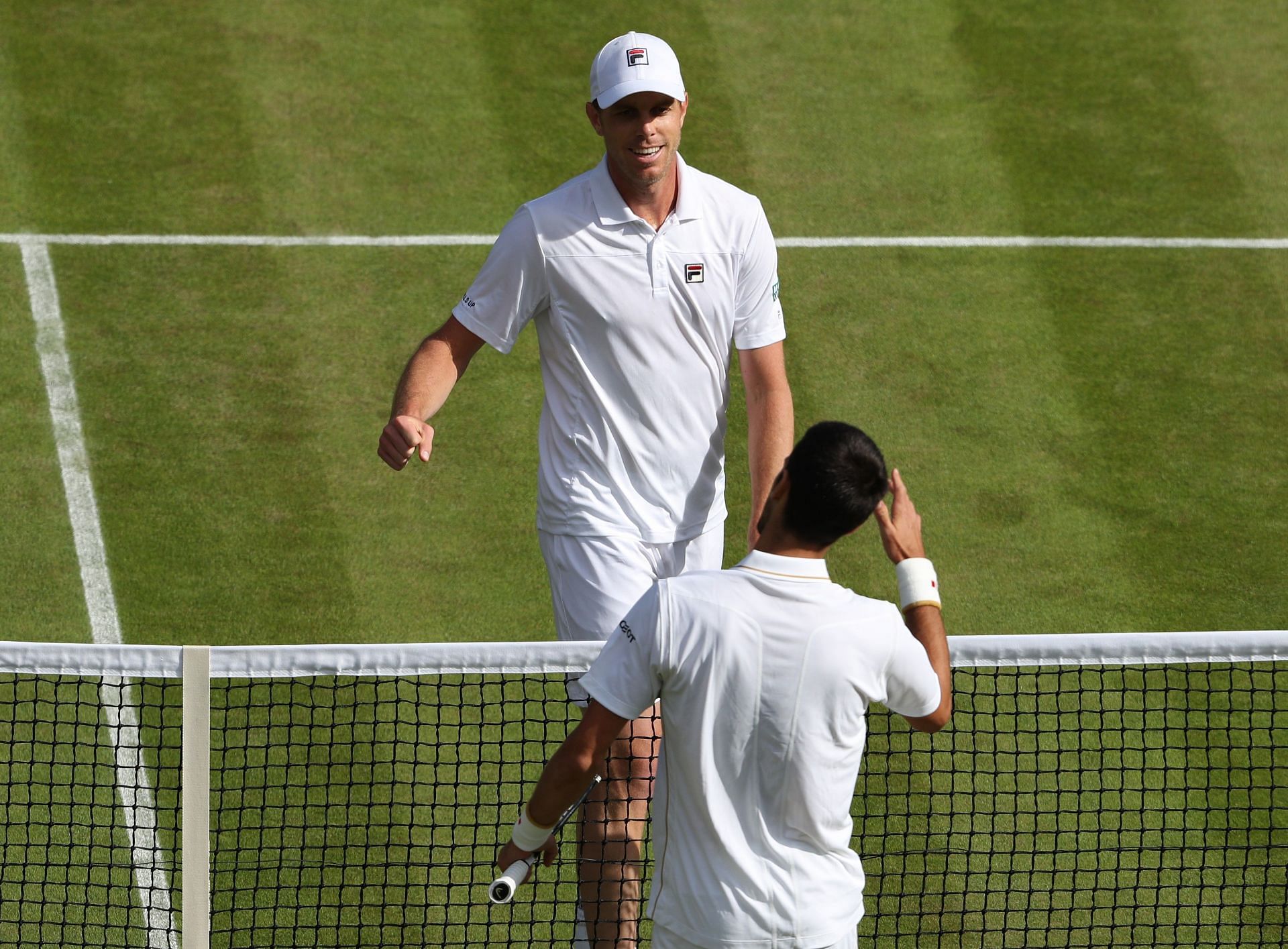 Sam Querrey and Novak Djokovic at the 2016 Wimbledon Championships. (Source: Getty)